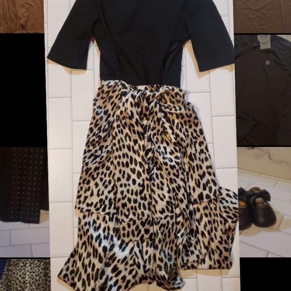 cute black top with leopard print bottom dress. brand new never used